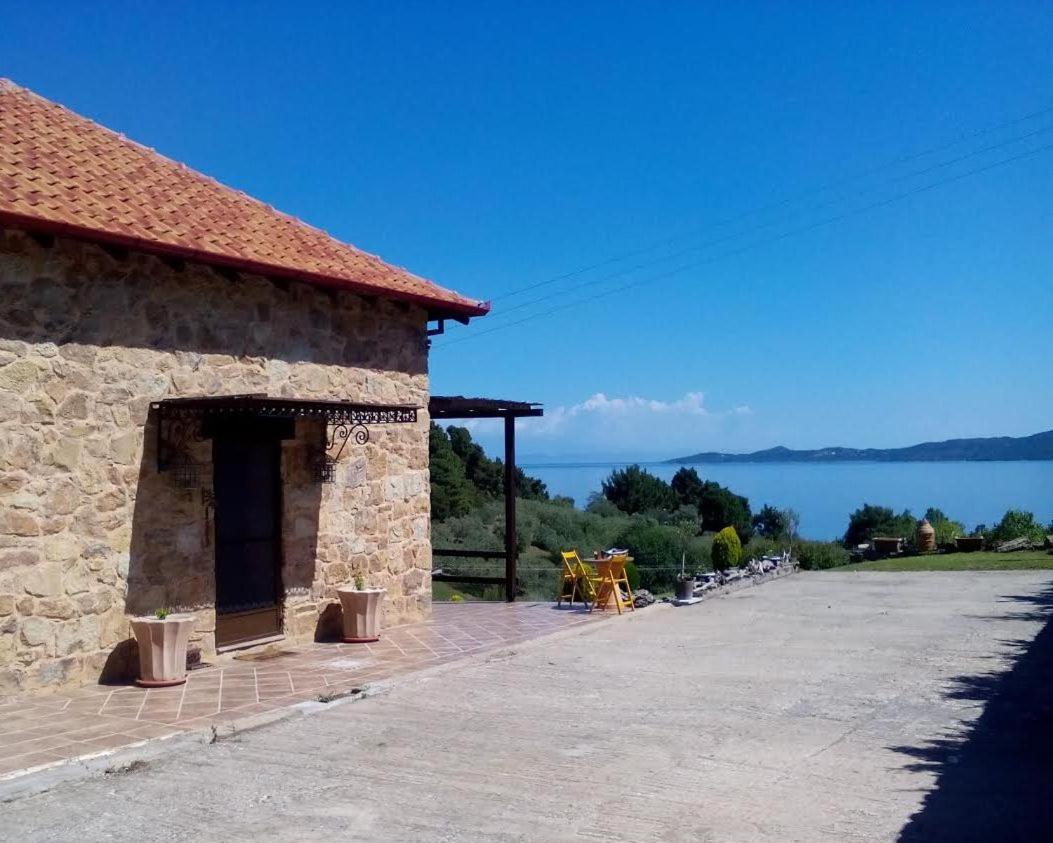 Stonehouse & Casa Al Sole E Al Mare Villa Nea Roda Bagian luar foto